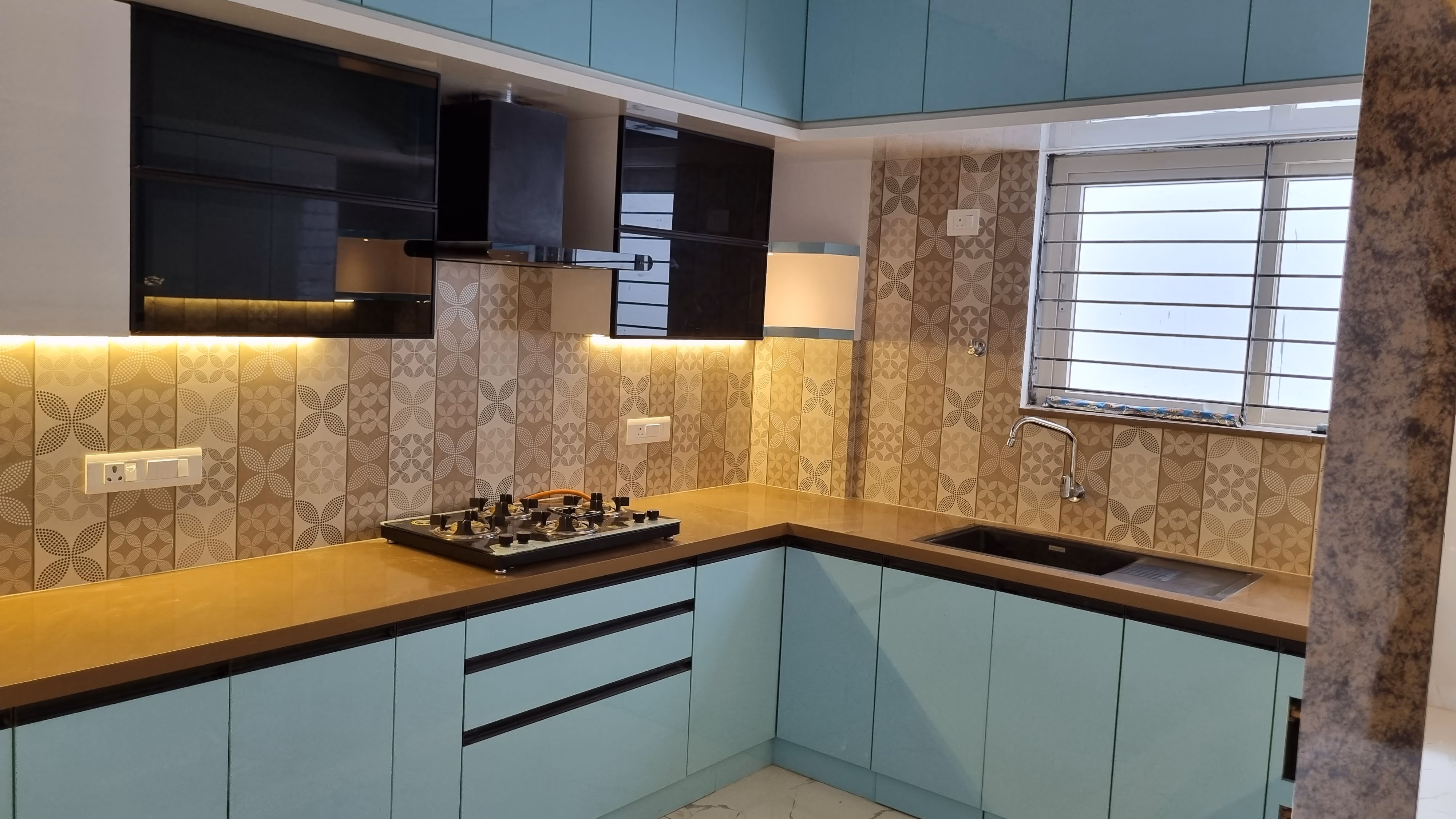 Parallel kitchen layout with a full-height storage wall