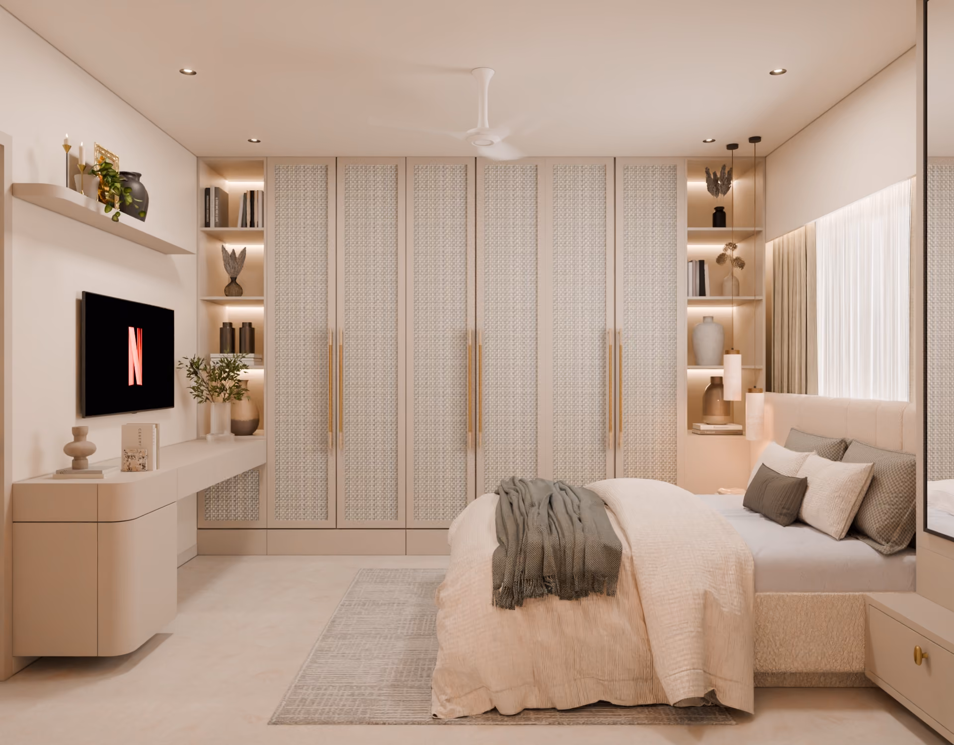 Fitted wardrobe wall with open display shelving in a bedroom